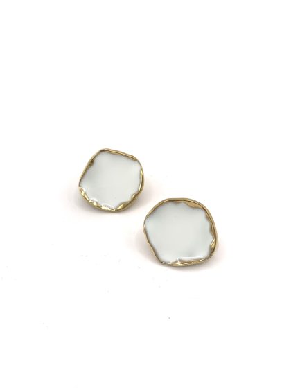 στρογγυλό λευκό κλιπ με χρυσή λεπτομέρεια